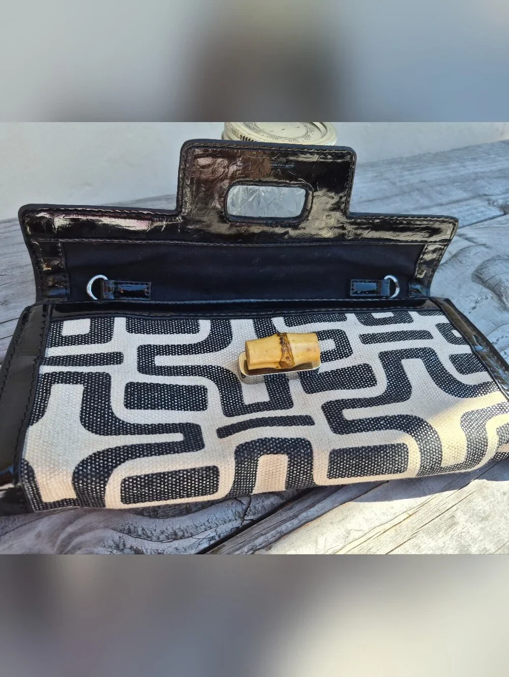 Sondra Roberts Black and Cream Geometric Canvas Clutch with Bamboo Accent